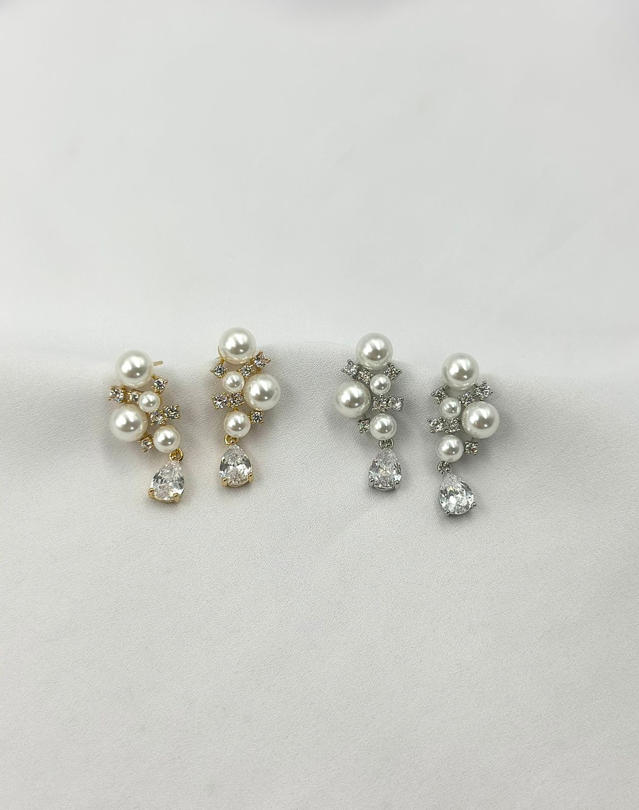 Brinco em formato de pérolas e luz